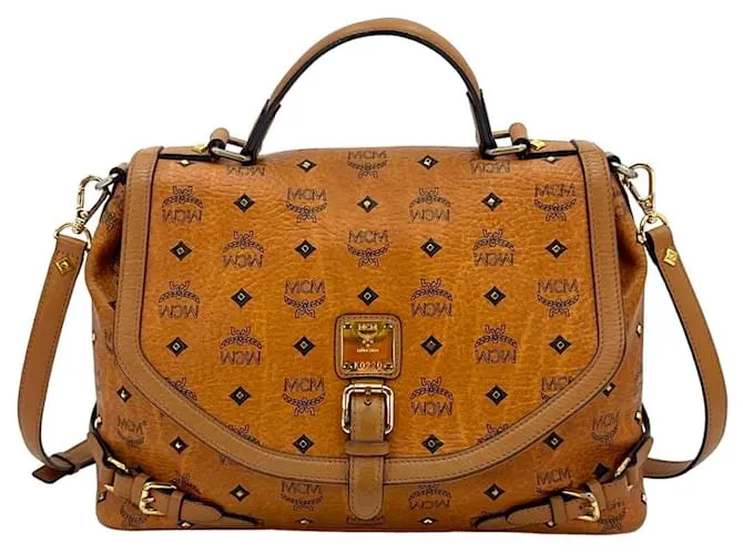 MCM Bolso de hombro FlapBag Bolso cruzado Bolso coñac Tachuelas Remaches LogoPrint 